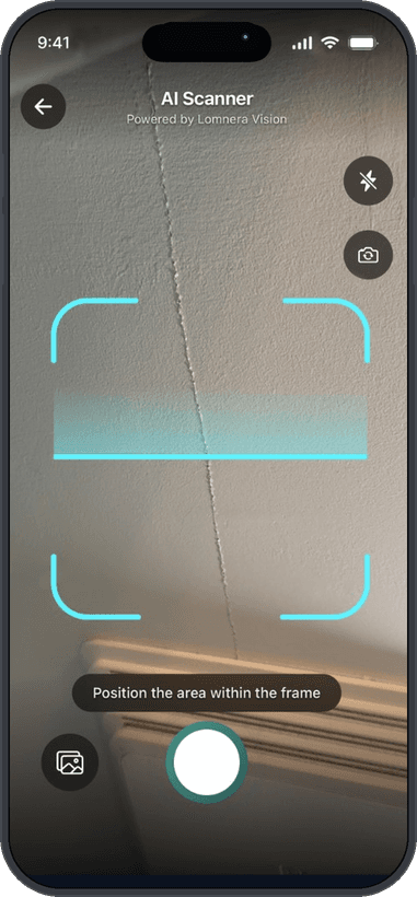 Lomnera AI Scanner framing a ceiling crack with a scan line and the prompt to position the area within the frame